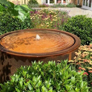 Круглый стол для воды из кортеновской стали